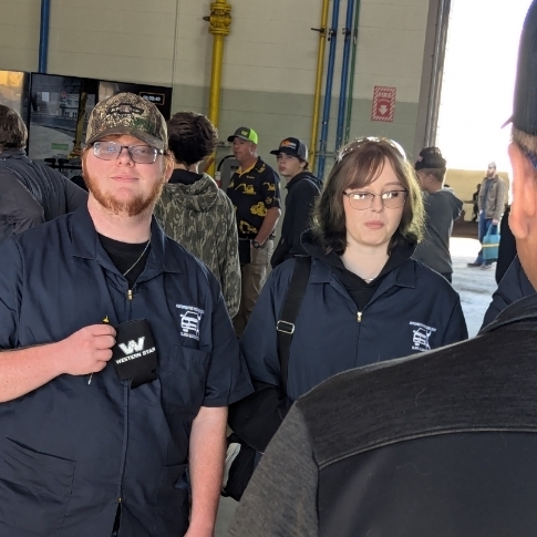 Students visit with industry professionals, learning about employment opportunities.