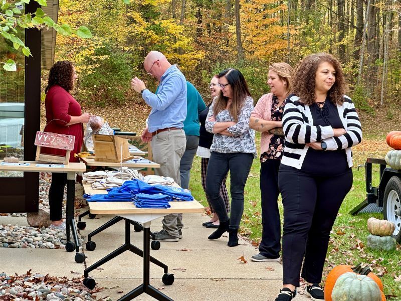 CGRESD Staff looking over silent auction