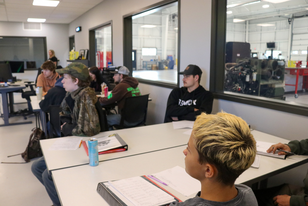 Instructor teaching students