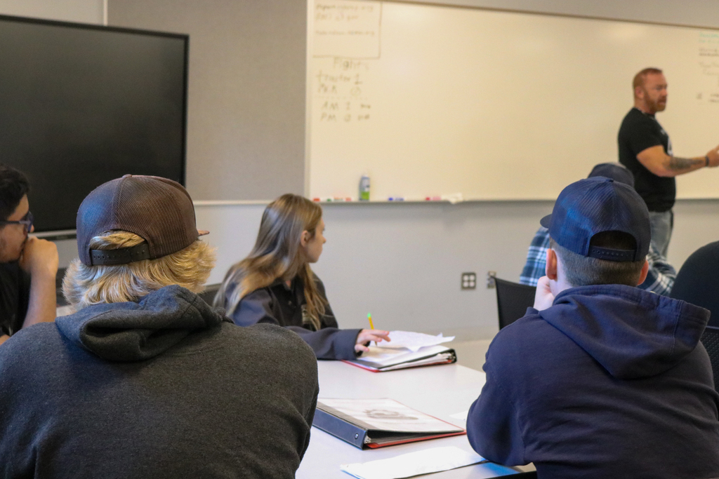 Instructor teaching students