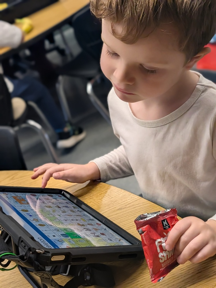 Student using AAC device
