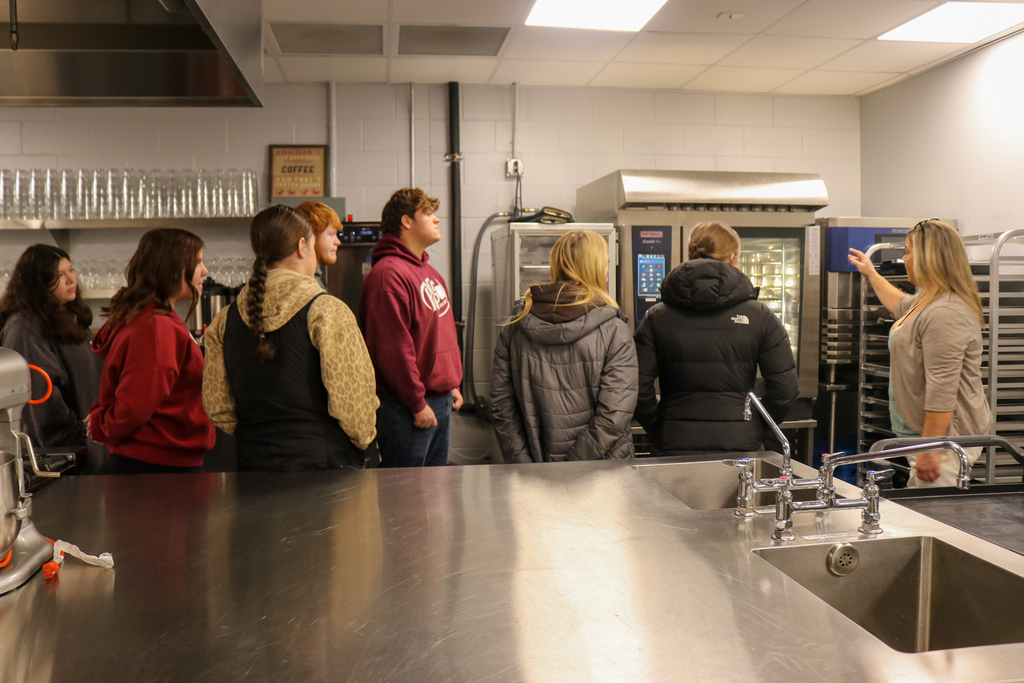 Culinary Arts Instructor showcasing the class to 10th graders