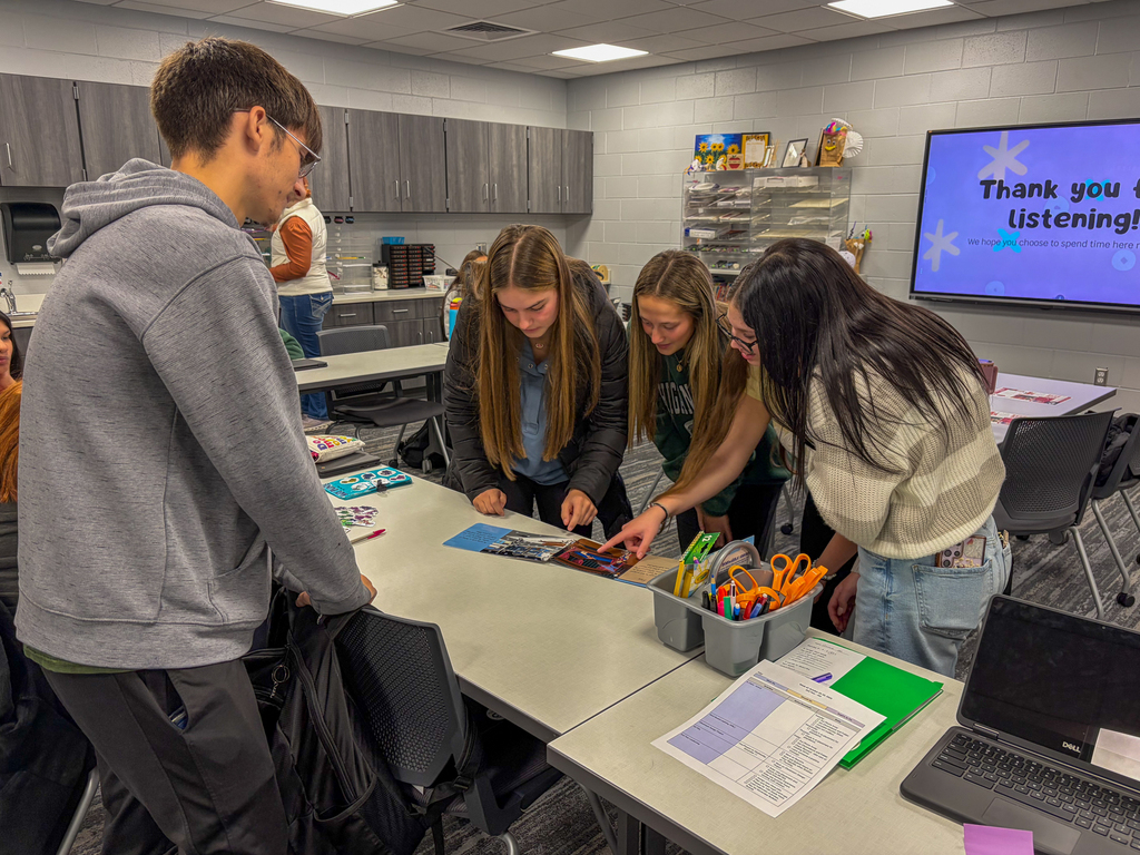 Education student showcasing the class to 10th graders