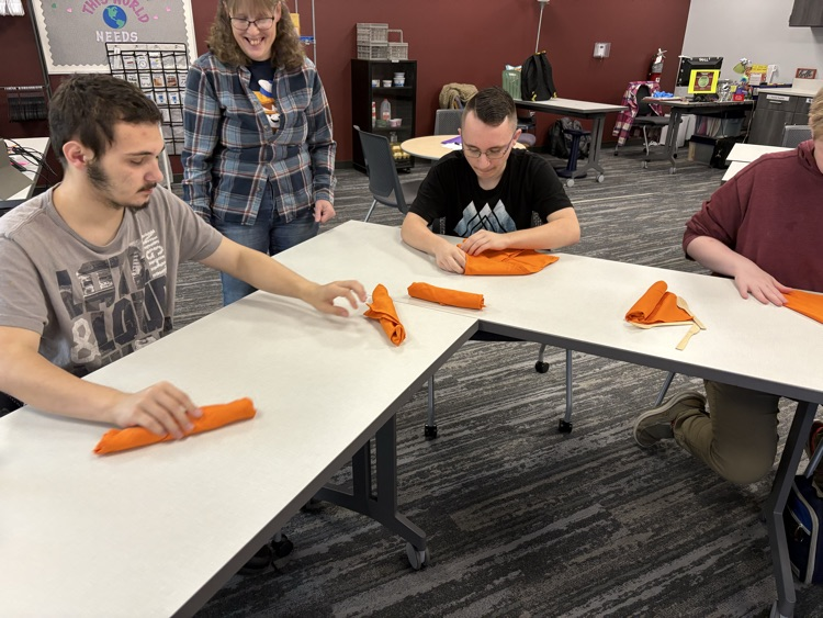 Learning how to roll silverware!