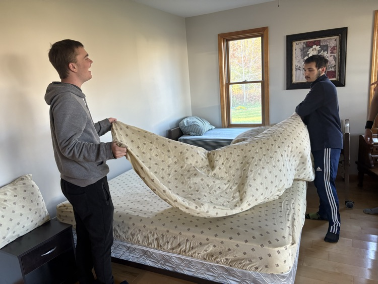 Learning how to wash bedding and make the beds at Verna’s house!