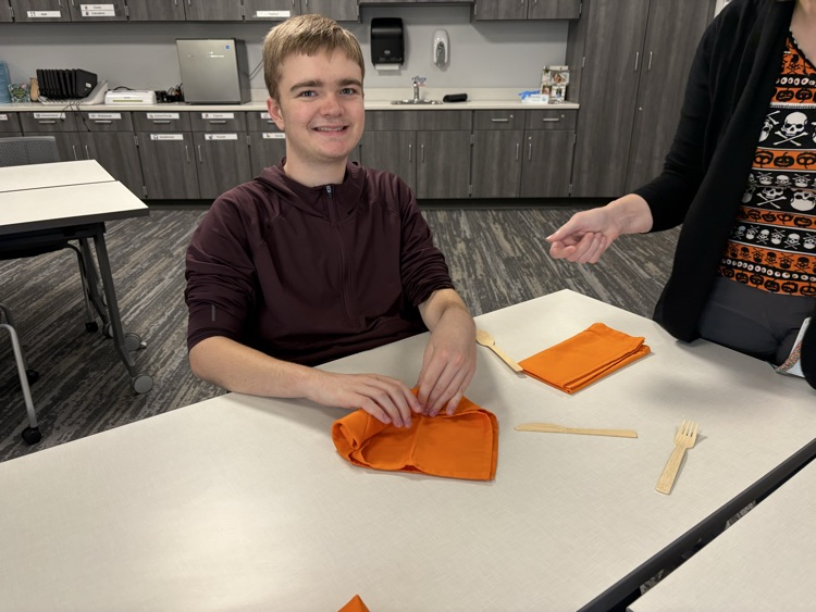 Learning how to roll silverware!
