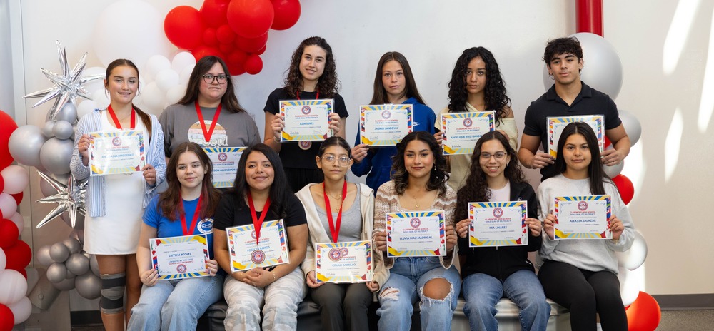 students with their seal of biliteracy medals and certificates 