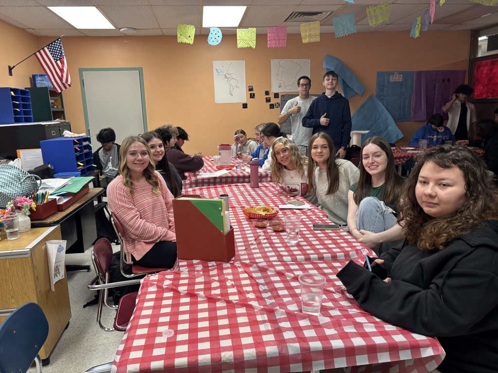 Students at chips and salsa party