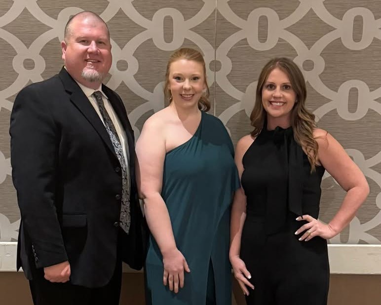 ms. meranda golbek with her admin team