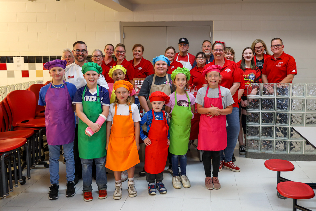 Group photo of Junior Chefs, Sous Chefs, Judges, and Zebra Staff