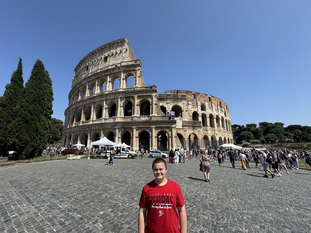 Class of 2025 graduate poses in various places all over Europe