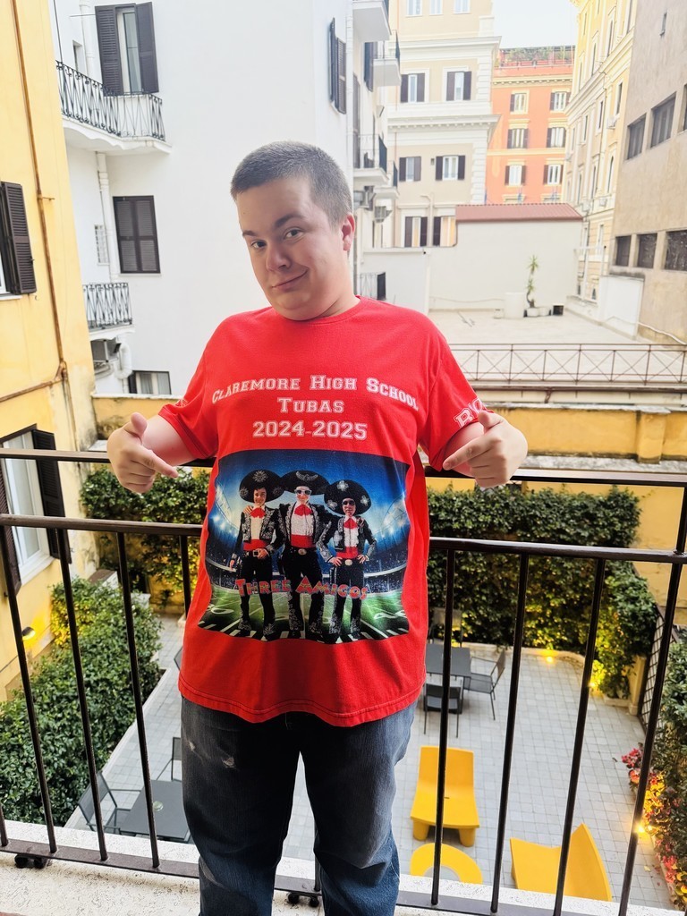Class of 2025 graduate poses in various places all over Europe