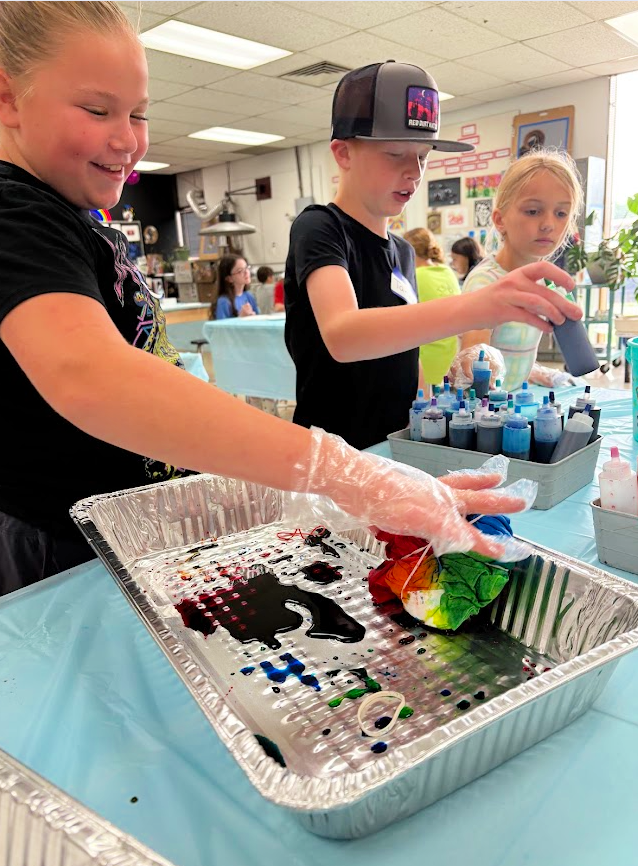 Art camp students work on art projects