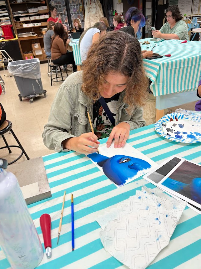 Art camp students work on art projects
