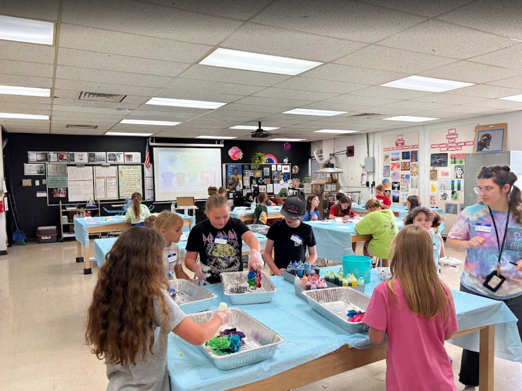 Art camp students work on art projects
