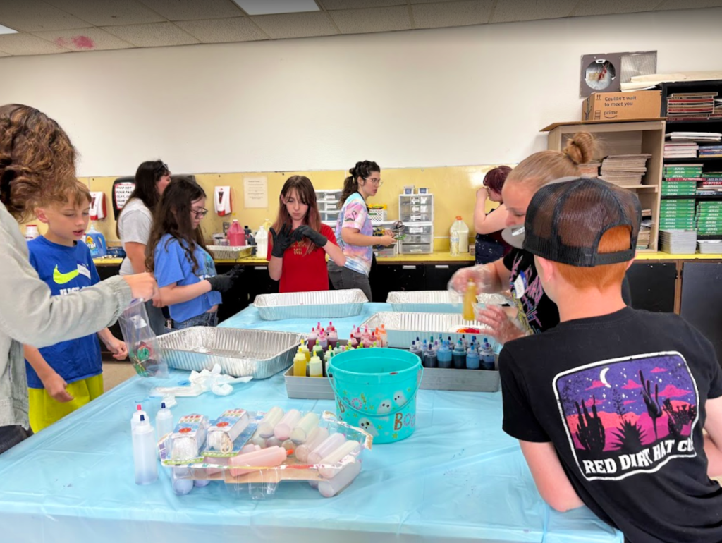 Art camp students work on art projects
