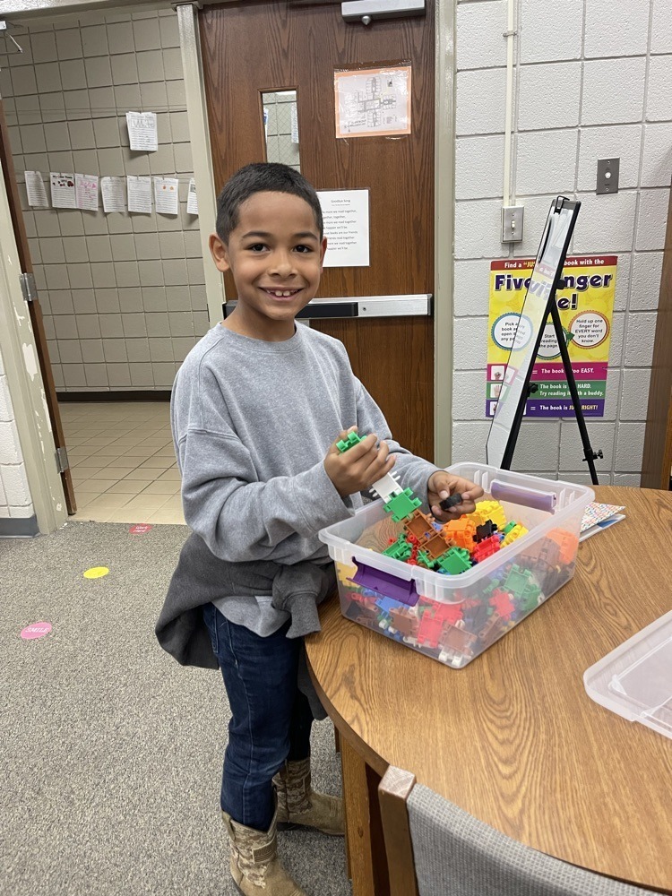 Claremont students playing with S.T.E.M bins at the library.