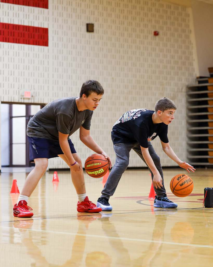 Basketball Campers run drills.