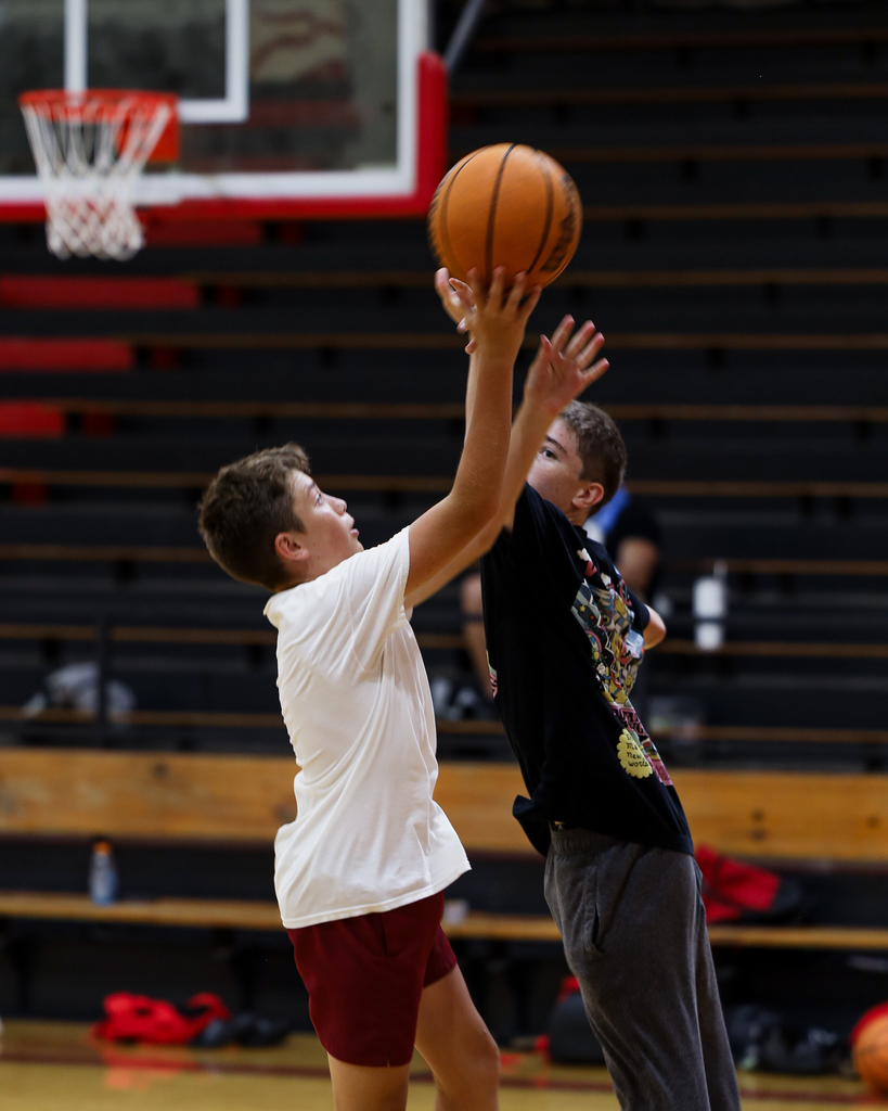 Basketball Campers play one on one.