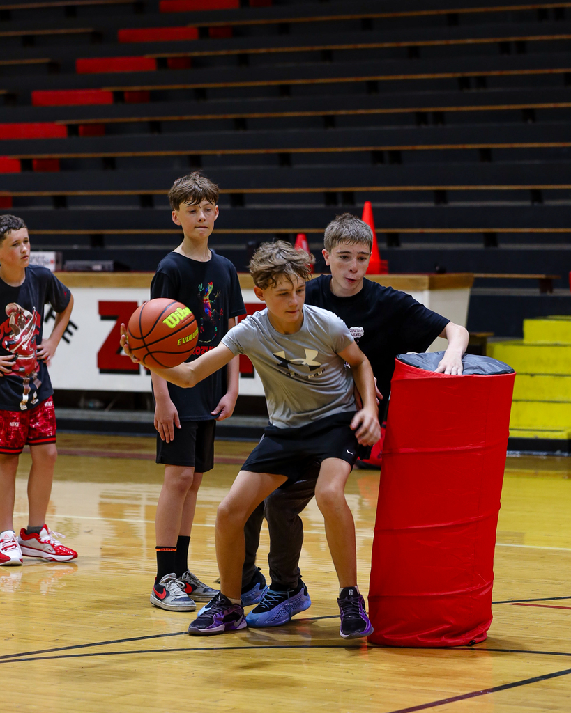 Basketball Campers run drills.