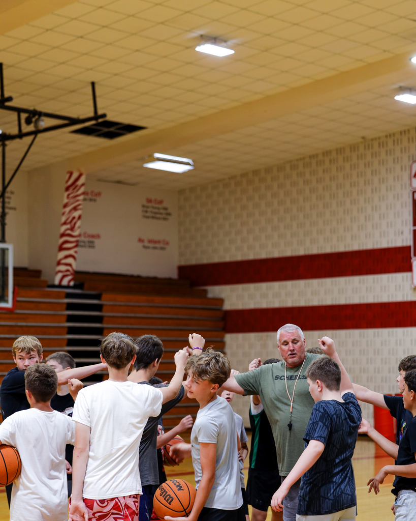 Basketball Camp group huddle.