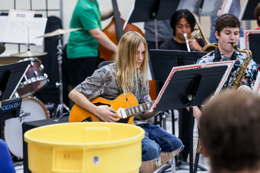 Student playing electric guitar at Jazz Summit