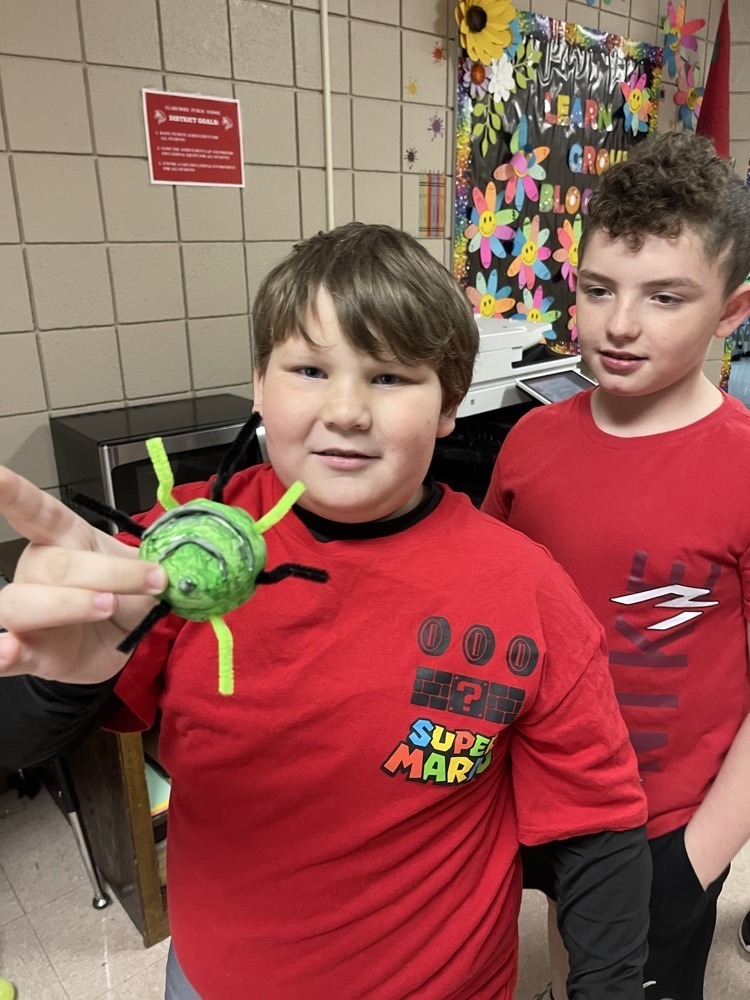 students with sculptures