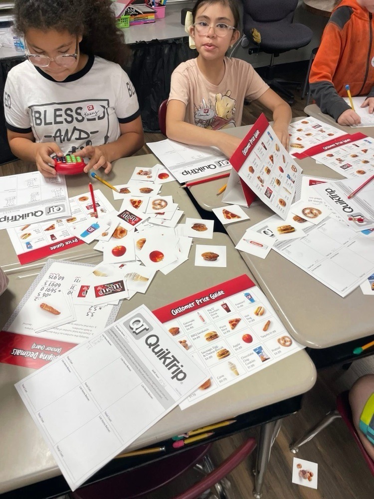 students doing a QT themed math lesson for real world application