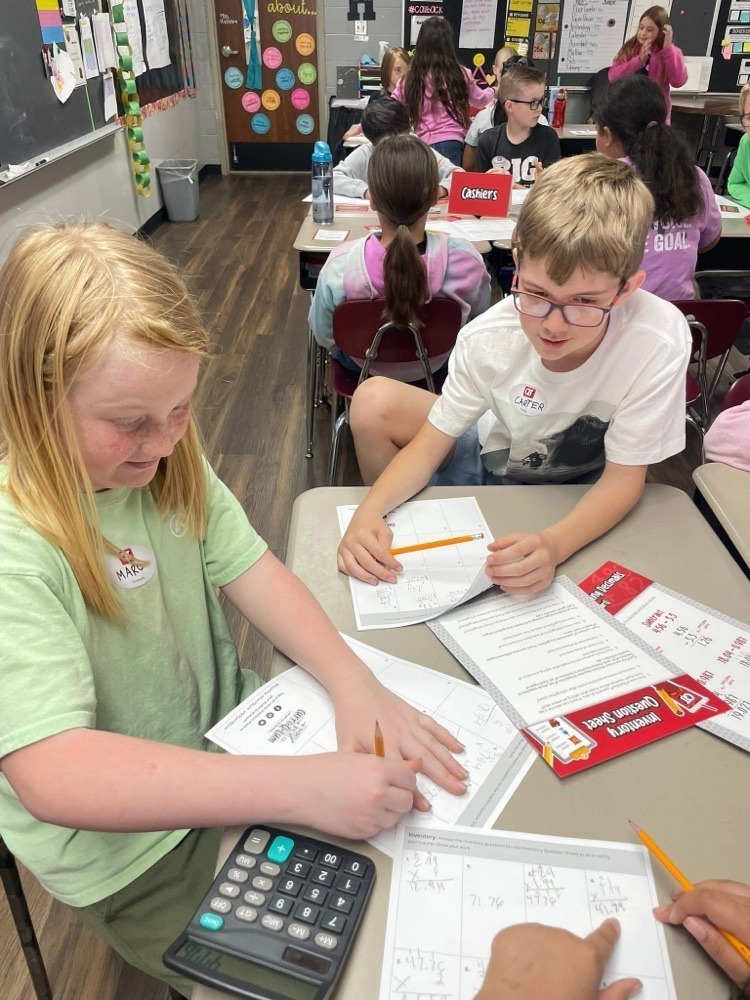 students doing a QT themed math lesson for real world application