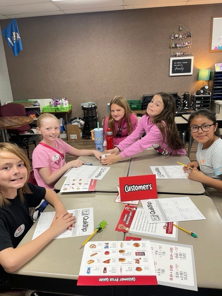 students doing a QT themed math lesson for real world application