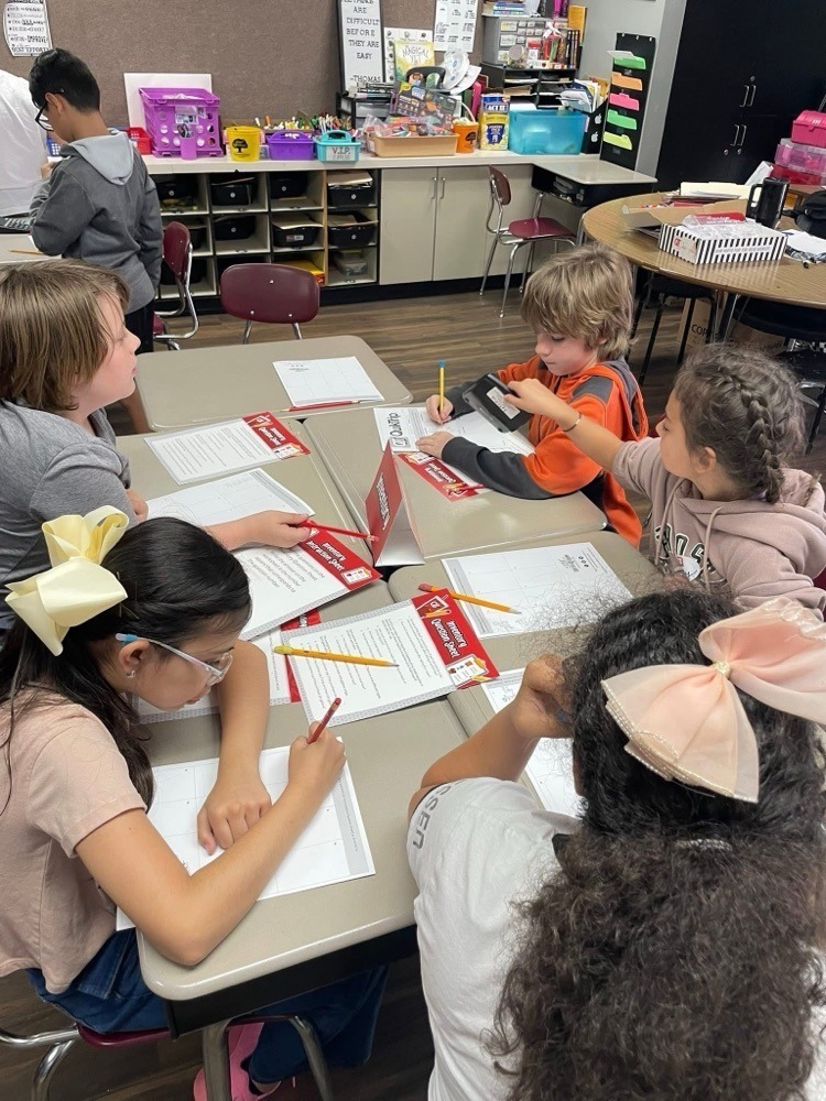 students doing a QT themed math lesson for real world application