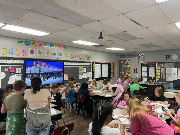 students doing a QT themed math lesson for real world application