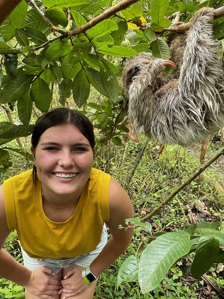 girl with a sloth