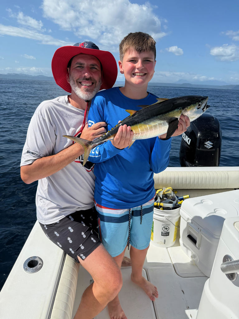dad and son with a fish