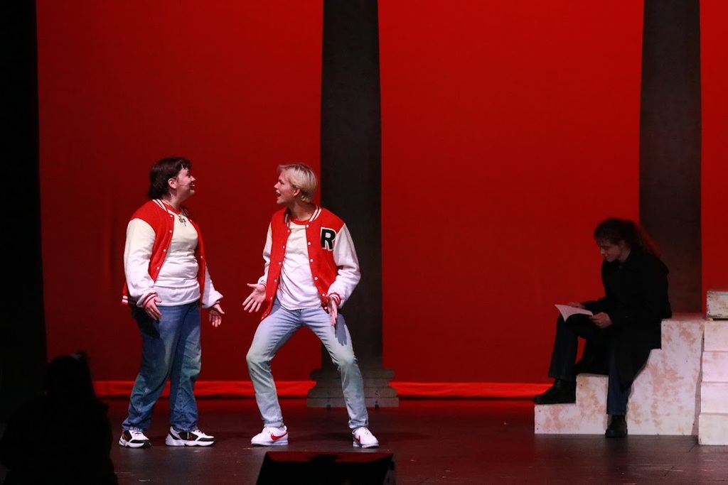 student performing in heathers the musical