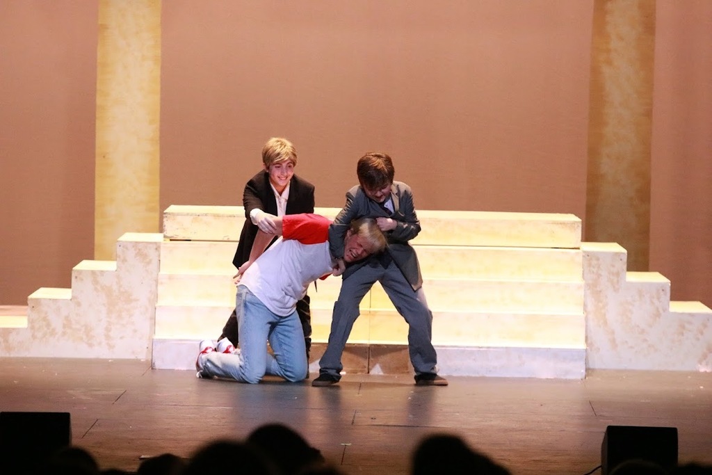 student performing in heathers the musical