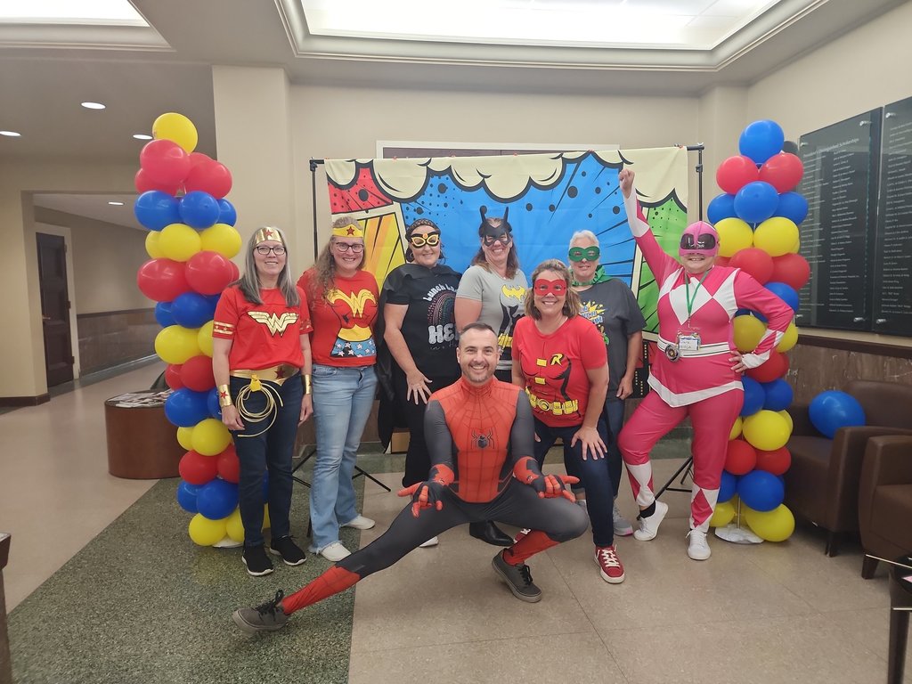 Zebra Nutrition staff as super heroes.