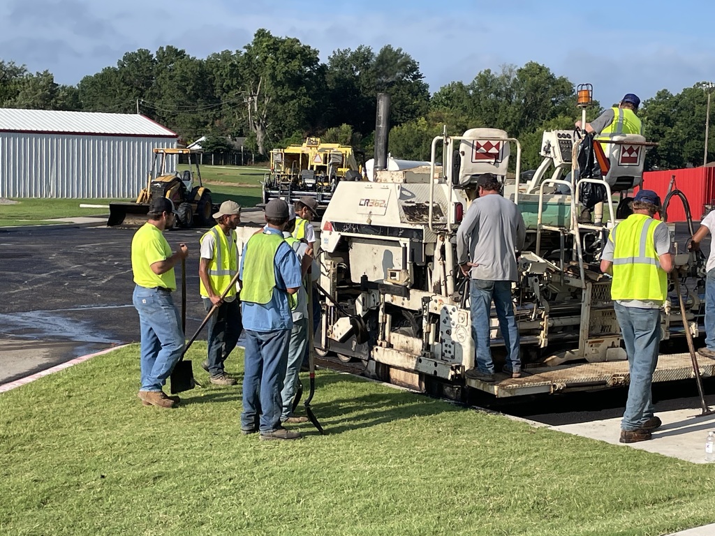 community members putting in new asphalt