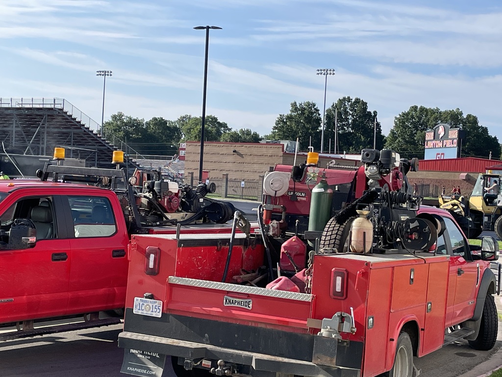 community members putting in new asphalt