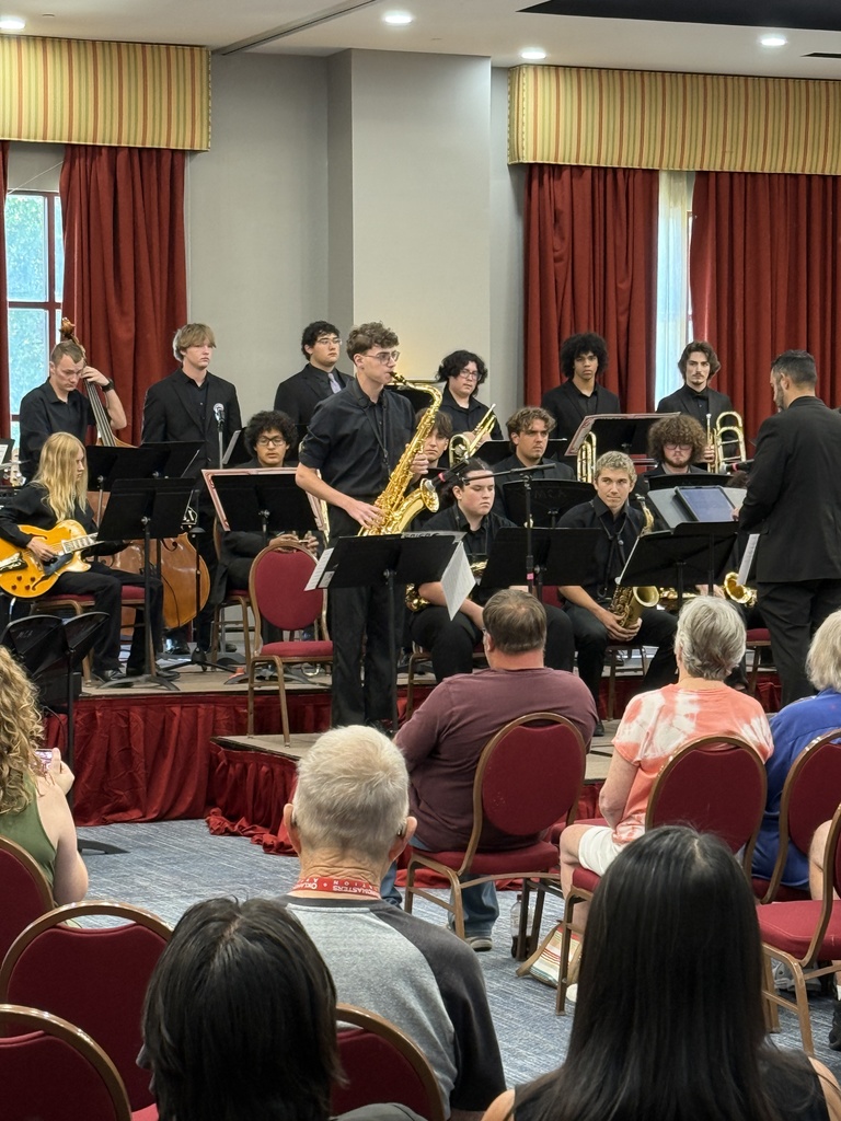 Logan Henosn playing a solo at OBA all star 