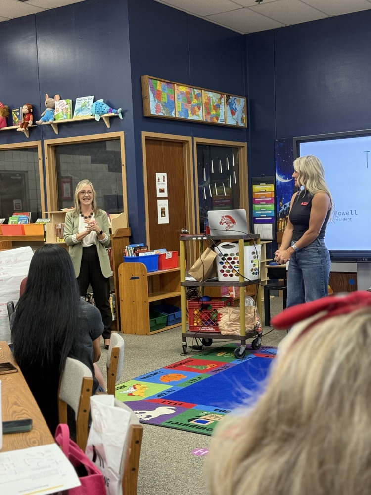 staff listening to principal talk 