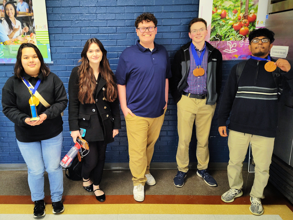 drama students with medals
