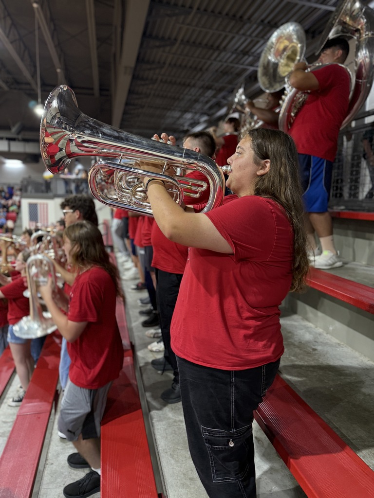 Student playing an instrument 