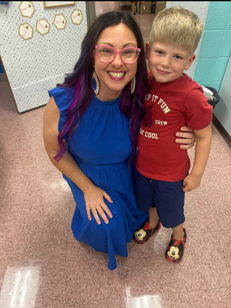 student with their teacher
