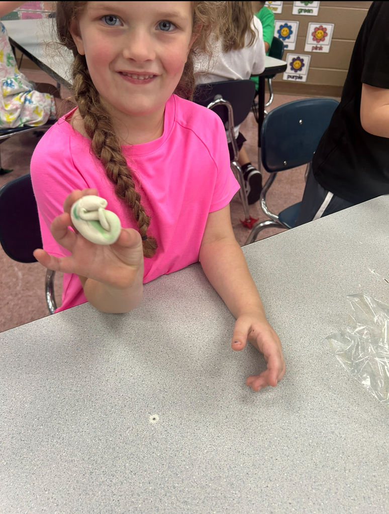 student playing with magic play-doh