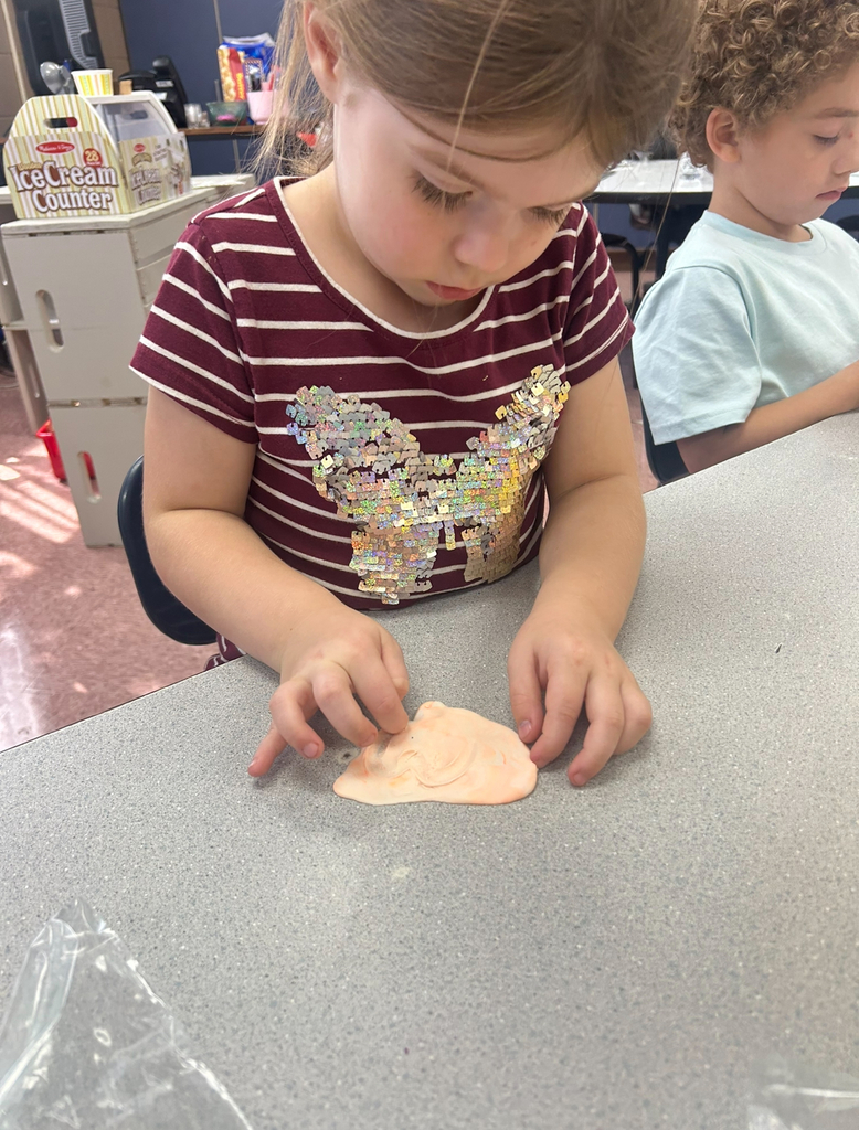 student playing with magic play-doh