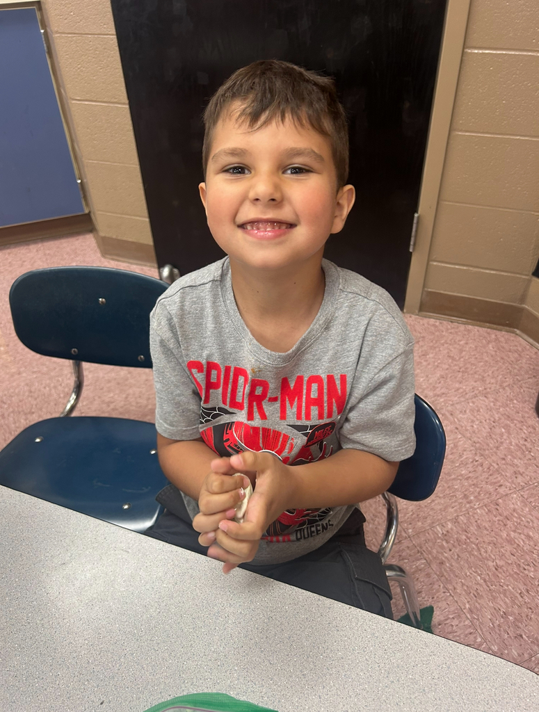 student playing with magic play-doh