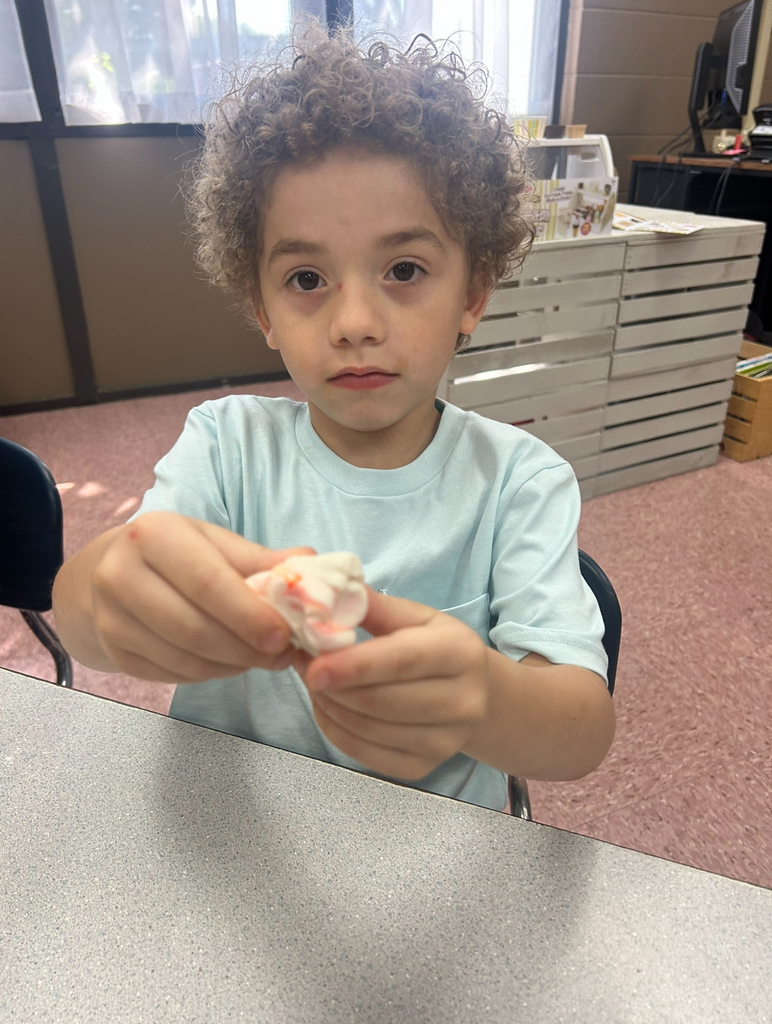 student playing with magic play-doh