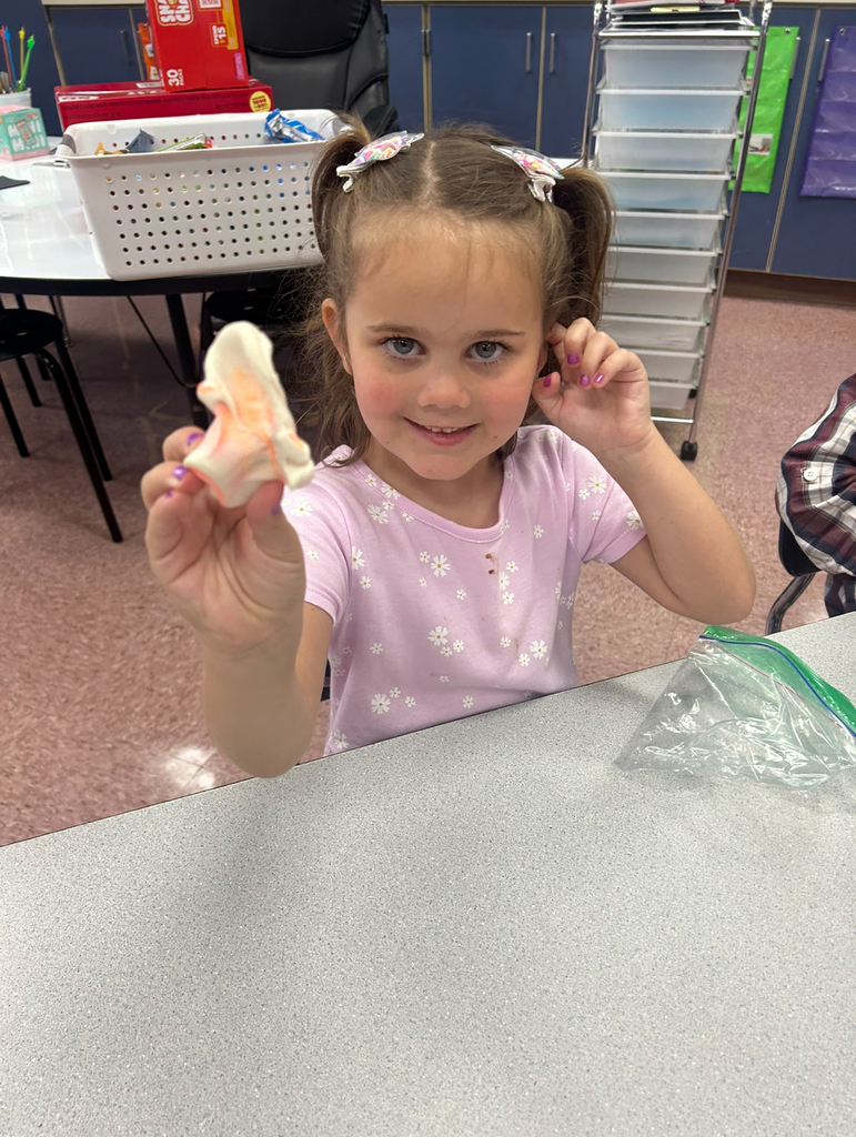 student playing with magic play-doh