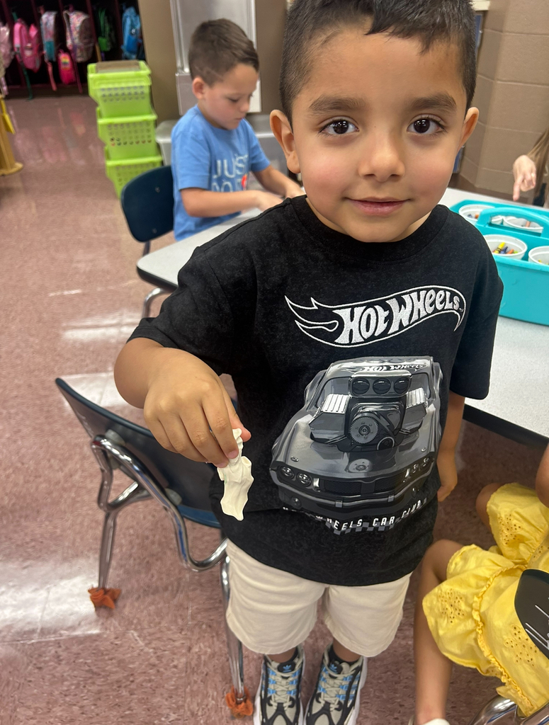 student playing with magic play-doh